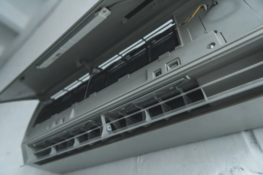 close up of opened air conditioner on wall 2024 11 18 13 33 32 utc